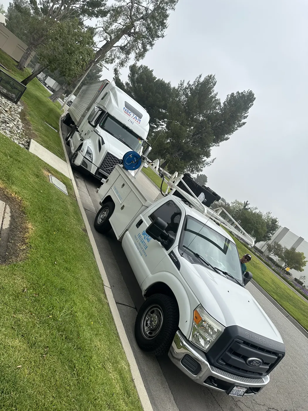 FreightFix service truck on site beside a semi truck in Southern California